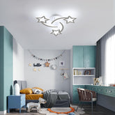 Modern bedroom with teal furniture, star-shaped ceiling light, and decorative elements.